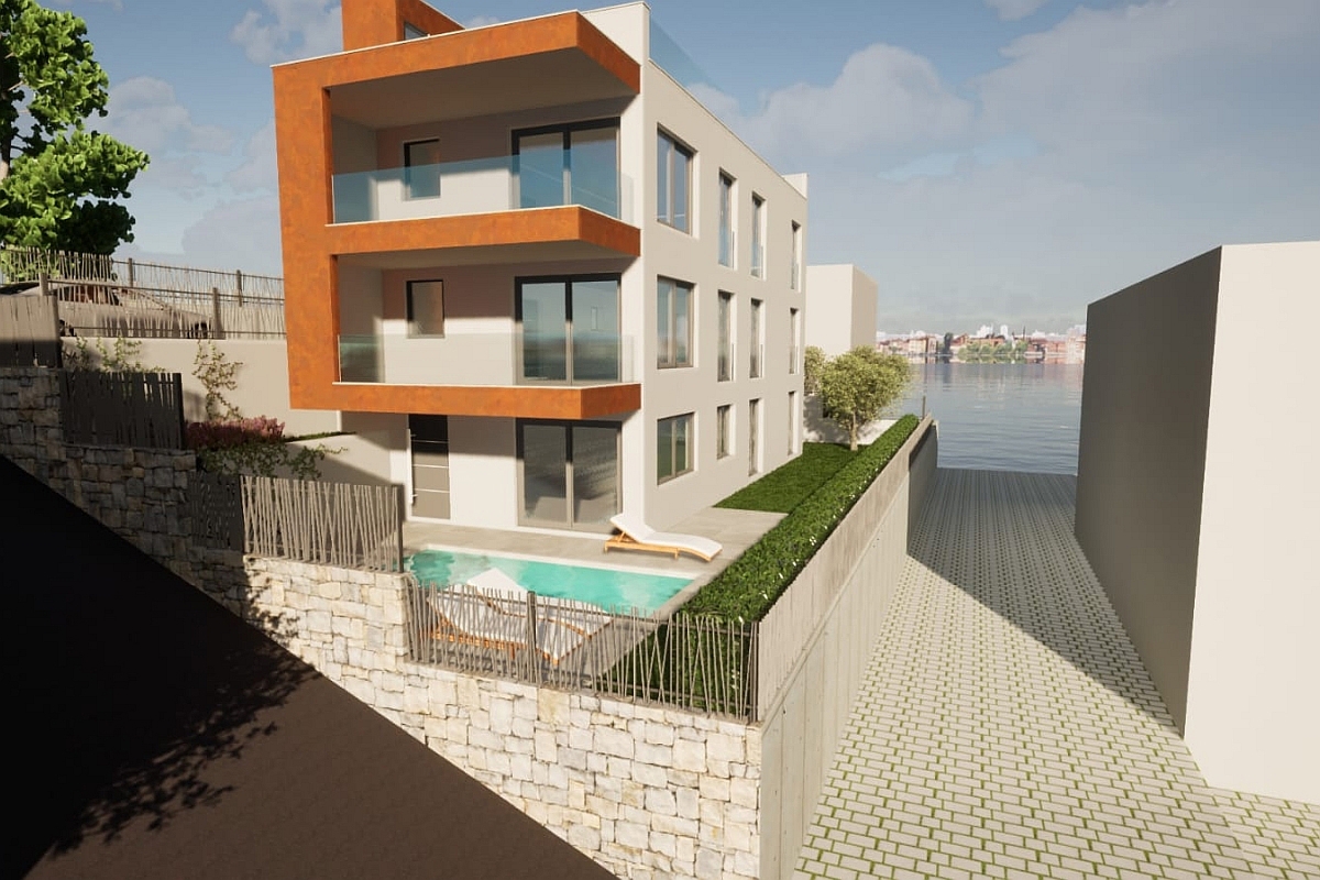 Ampio appartamento con piscina e giardino