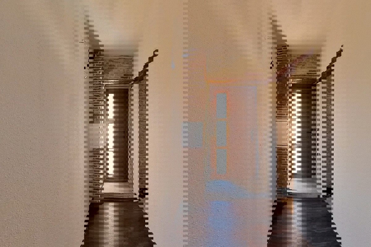 Casa bifamiliare in pietra