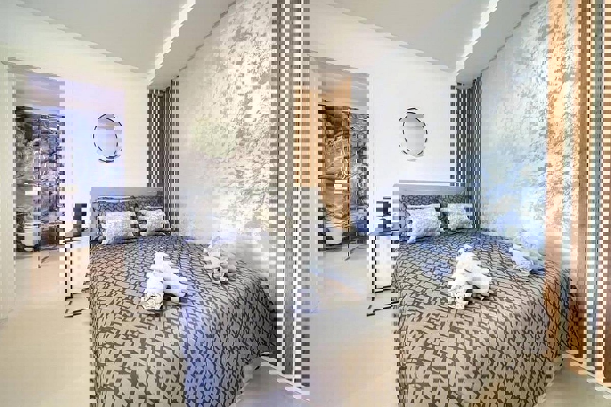 Moderno appartamento duplex con piscina