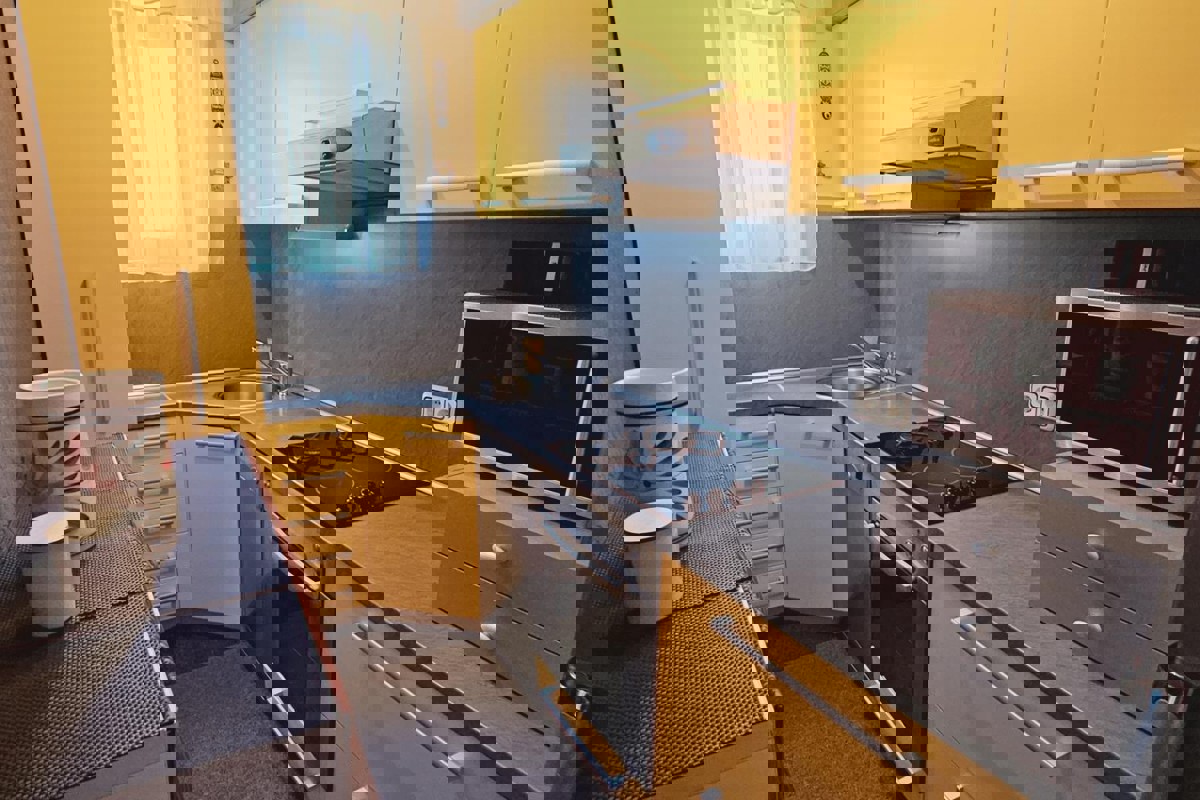 Appartamento con loggia e vista mare