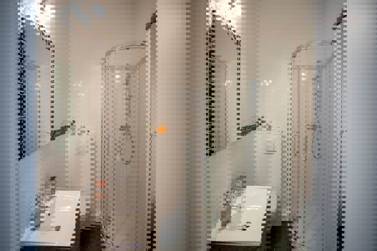 Appartamento con due camere da letto, garage e giardino vicino al centro