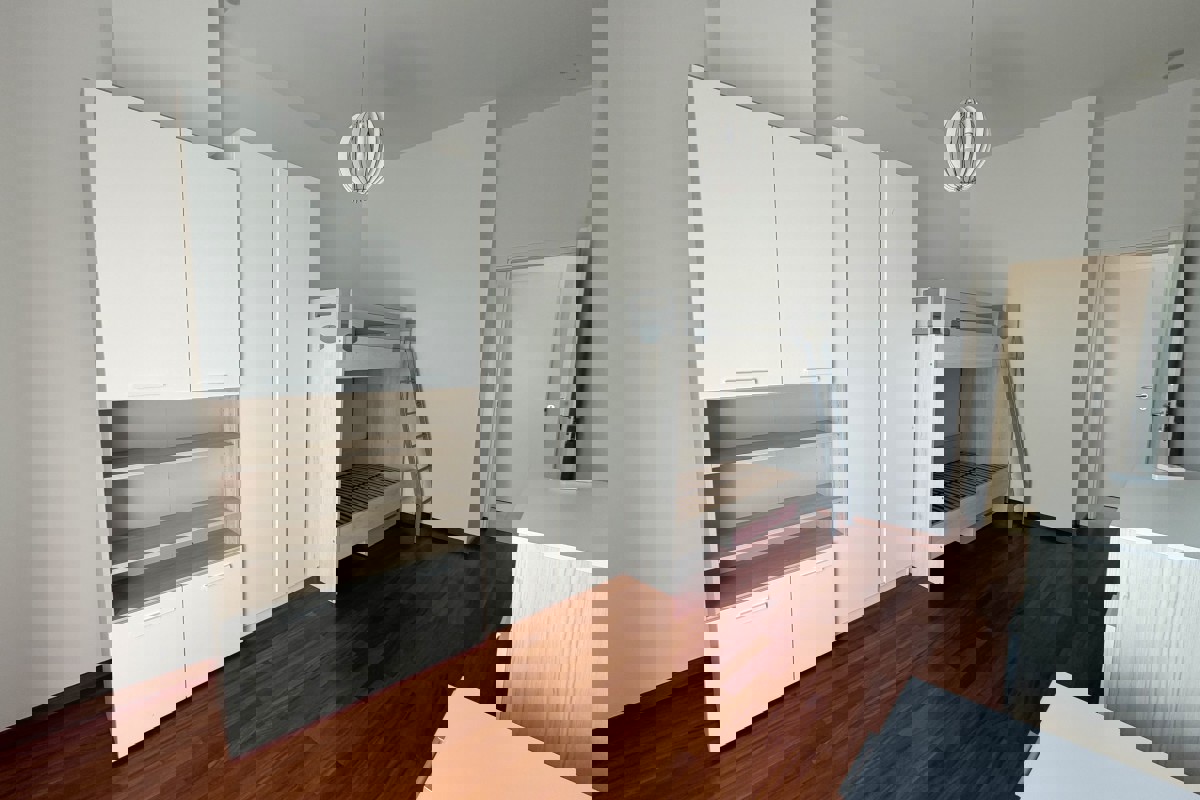 Appartamento con tre camere da letto e vista mare