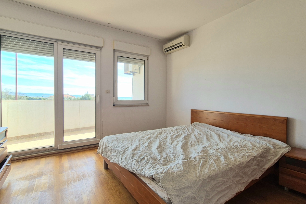 Appartamento con tre camere da letto e garage