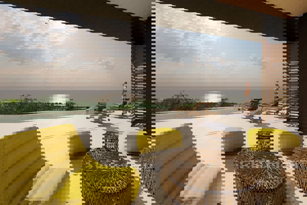 Terreno attraente con un progetto con vista aperta sul mare