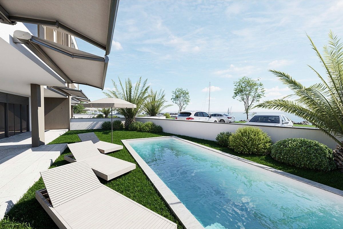 Lussuoso appartamento con piscina in prima fila sul mare