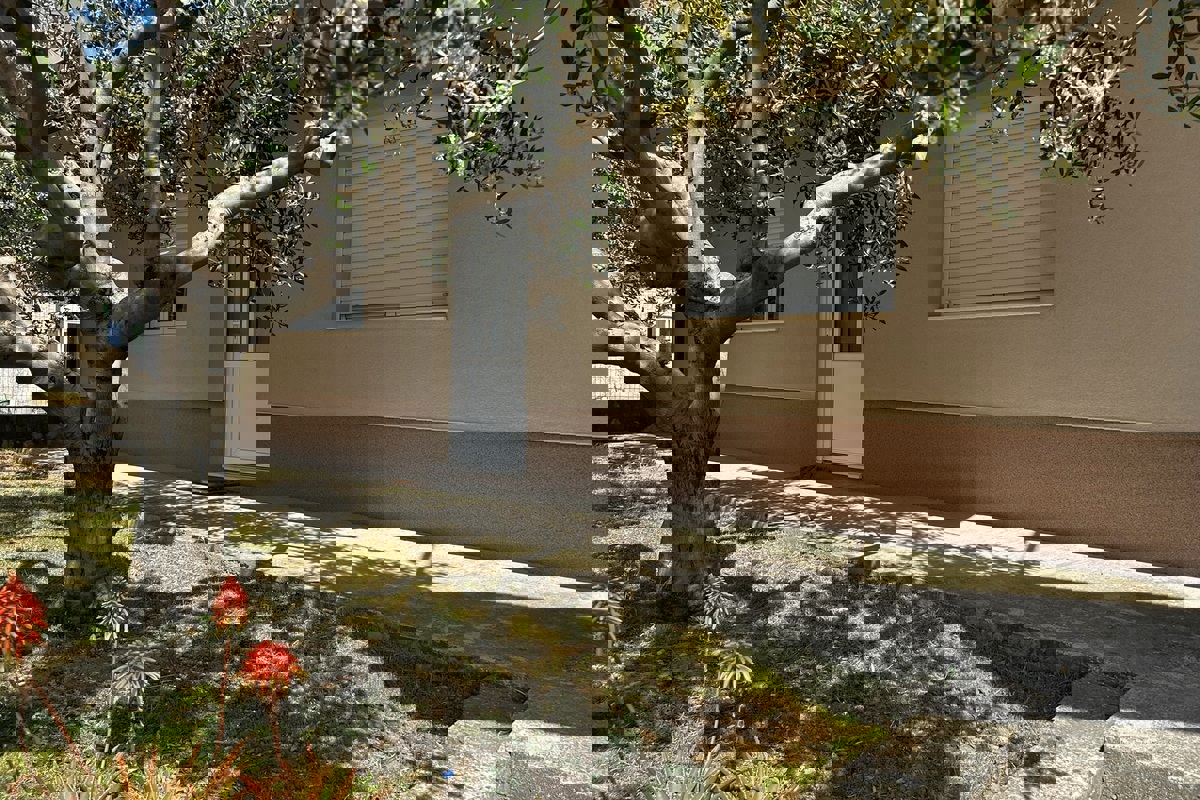Una casa con garage e giardino in posizione strategica a Spalato