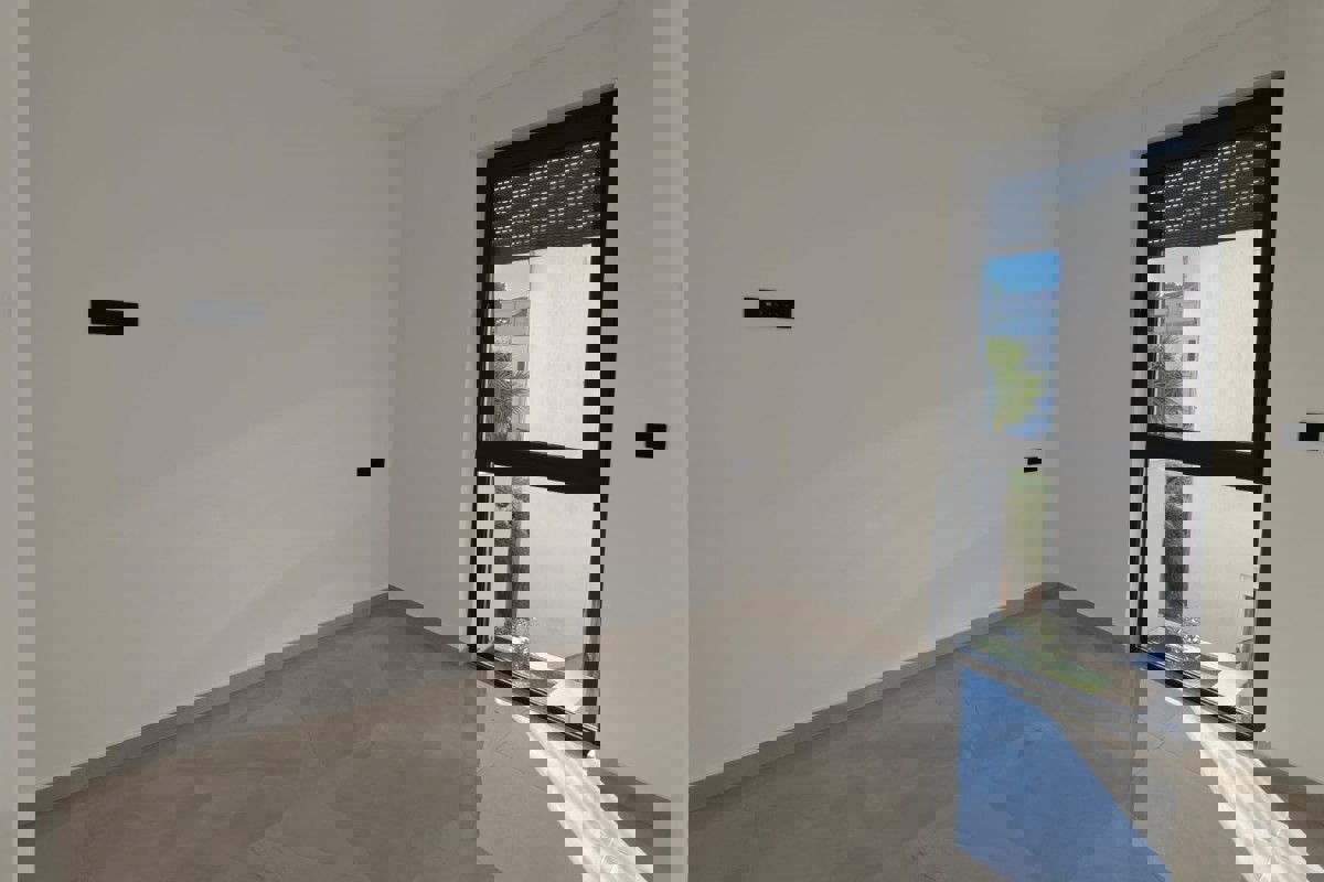 Comodo appartamento con tre camere da letto in un nuovo edificio