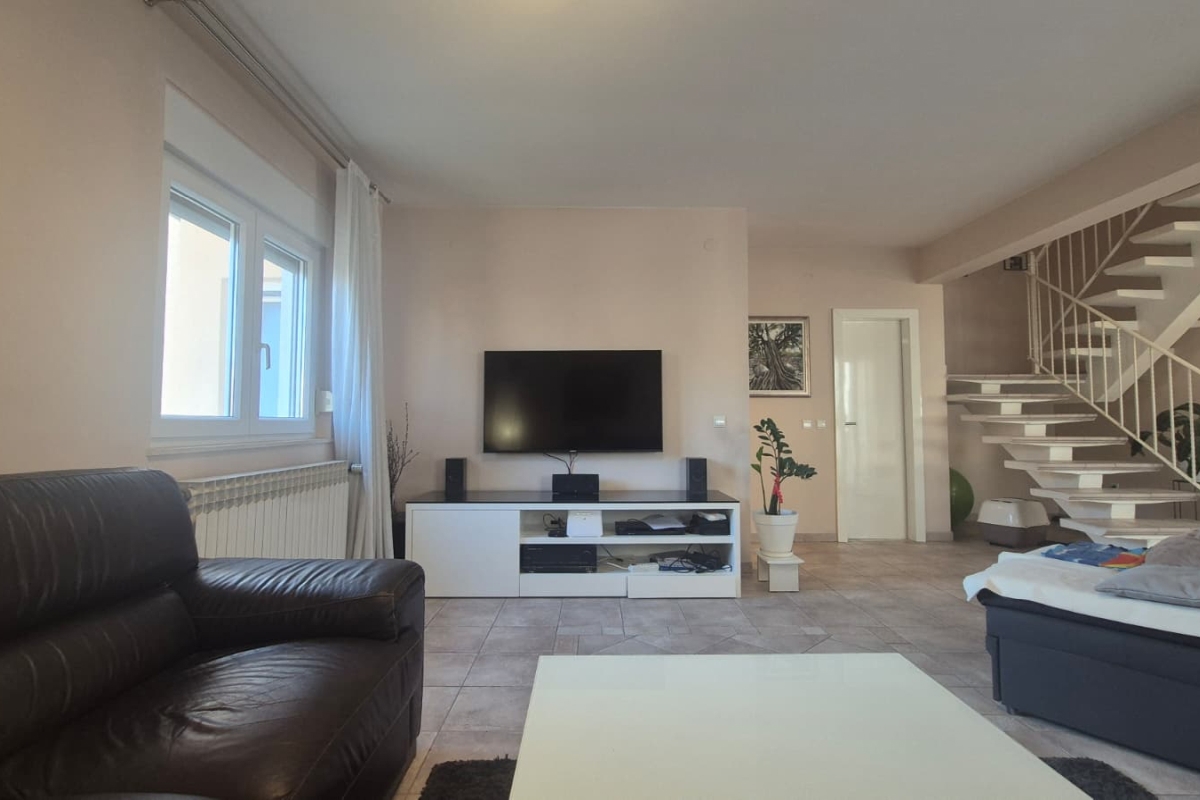 Appartamento duplex con tre camere da letto