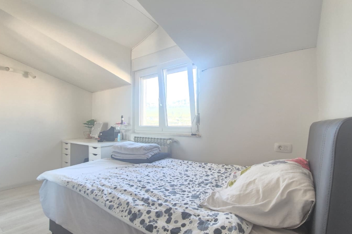 Appartamento duplex con tre camere da letto