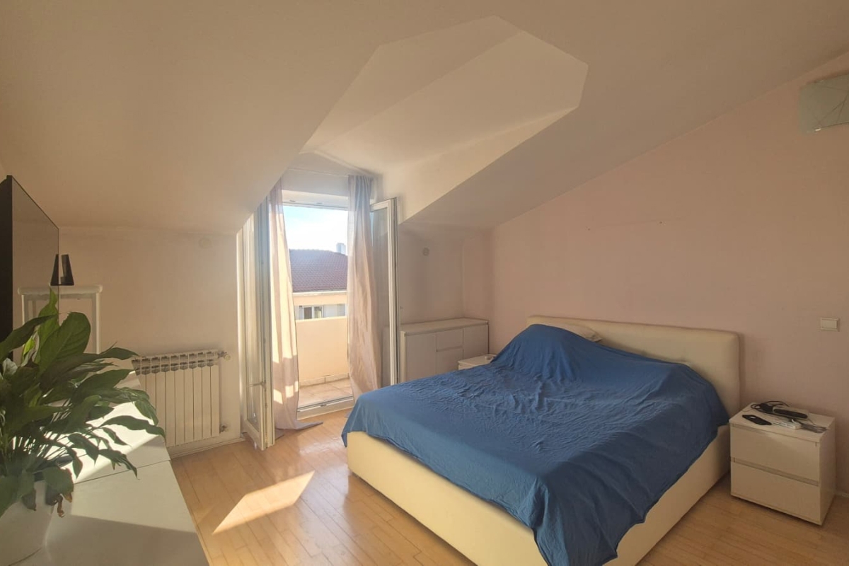 Appartamento duplex con tre camere da letto