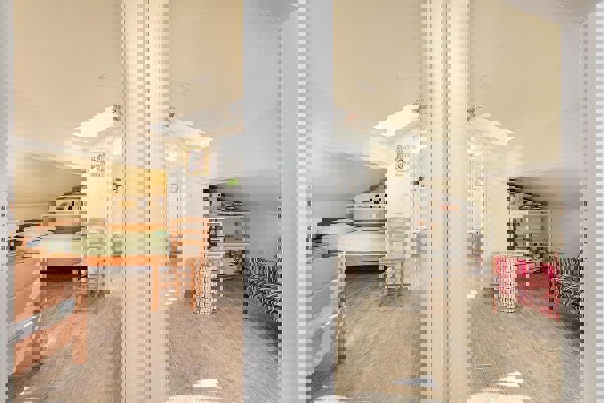 Appartamento duplex con vista mare