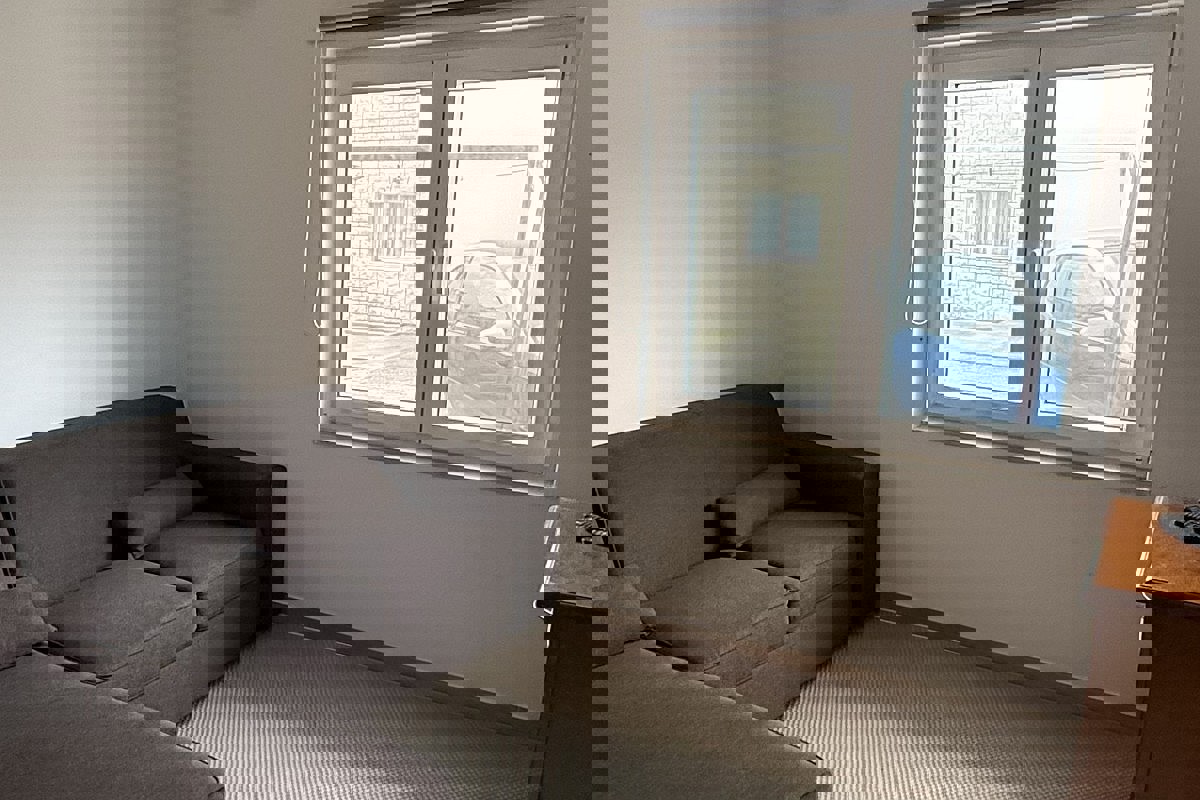 Casa bifamiliare con tre unità abitative in posizione tranquilla