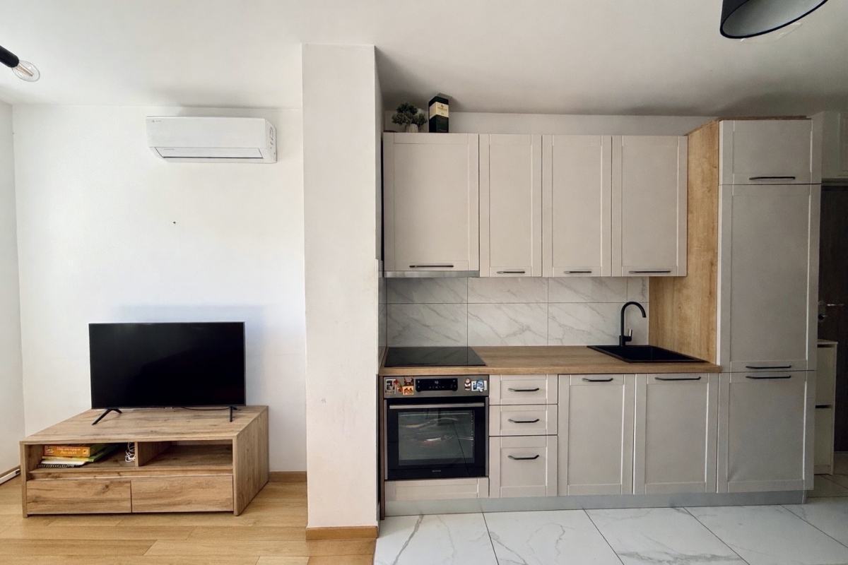 Appartamento funzionale e luminoso con due camere da letto e due posti auto