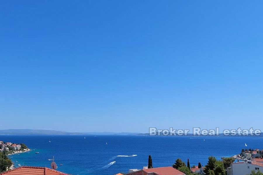 Appartamento con terrazza sul tetto e vista mare