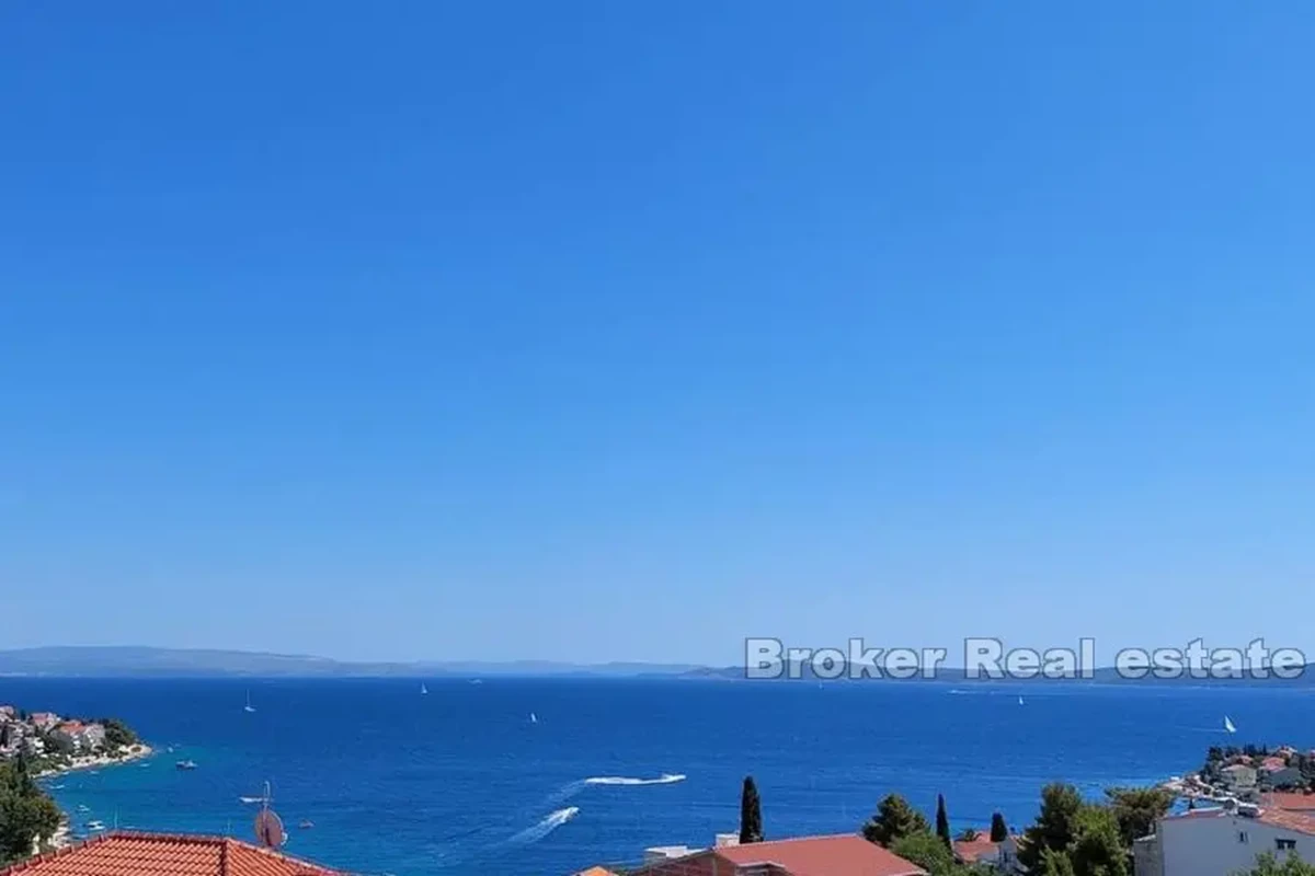 Appartamento con terrazza sul tetto e vista mare