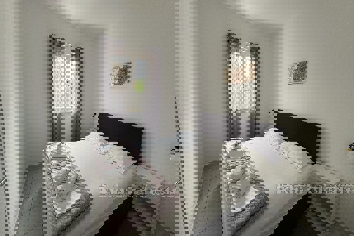 Appartamento con tre camere da letto con vista mare