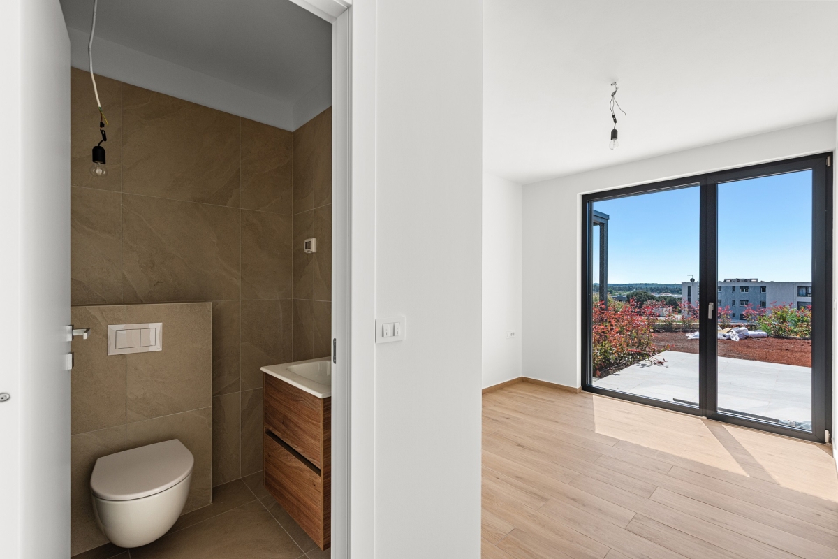 Lussuoso appartamento con ampio giardino e vista mare