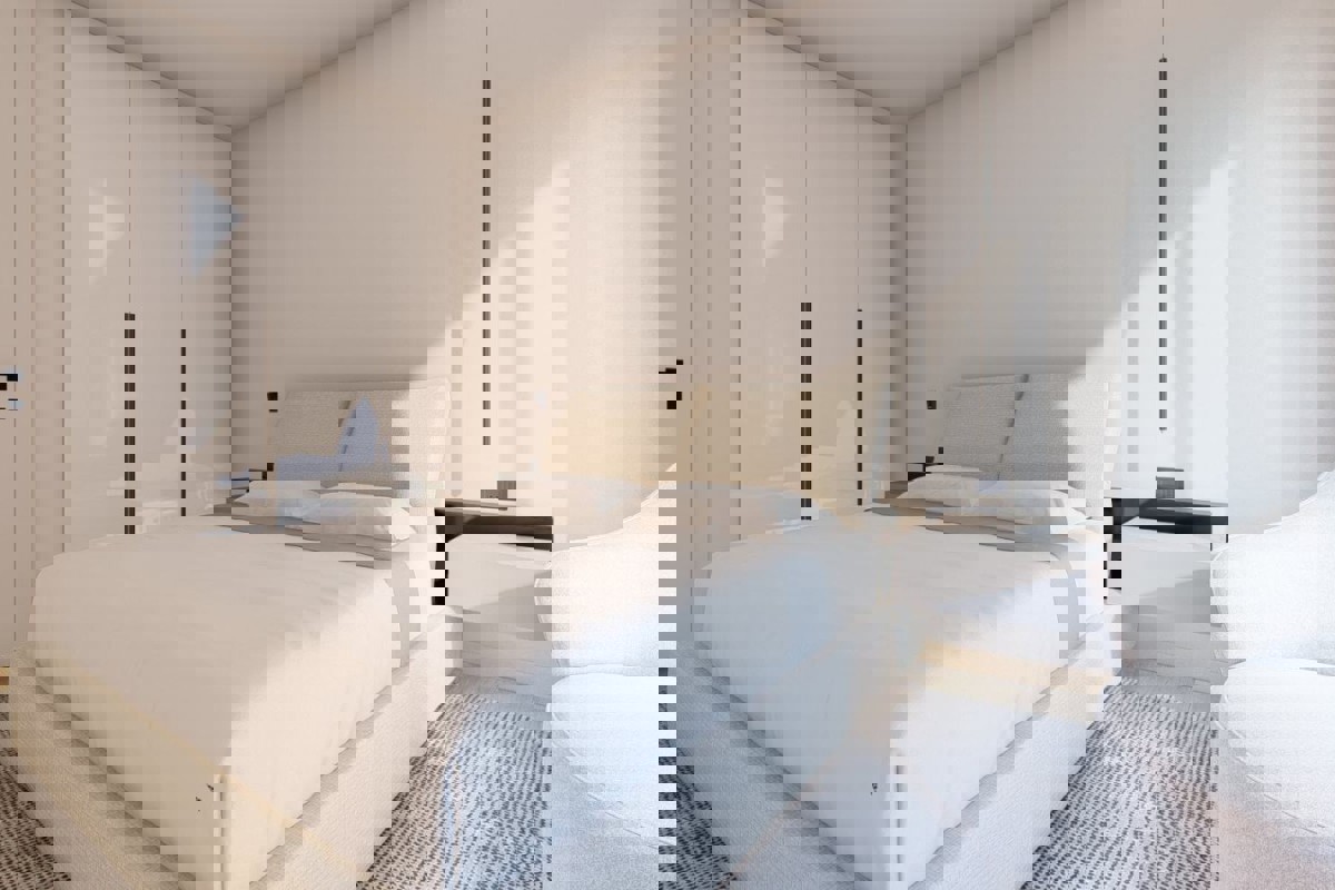 Moderno appartamento con tre camere da letto in un edificio di nuova costruzione con vista mare