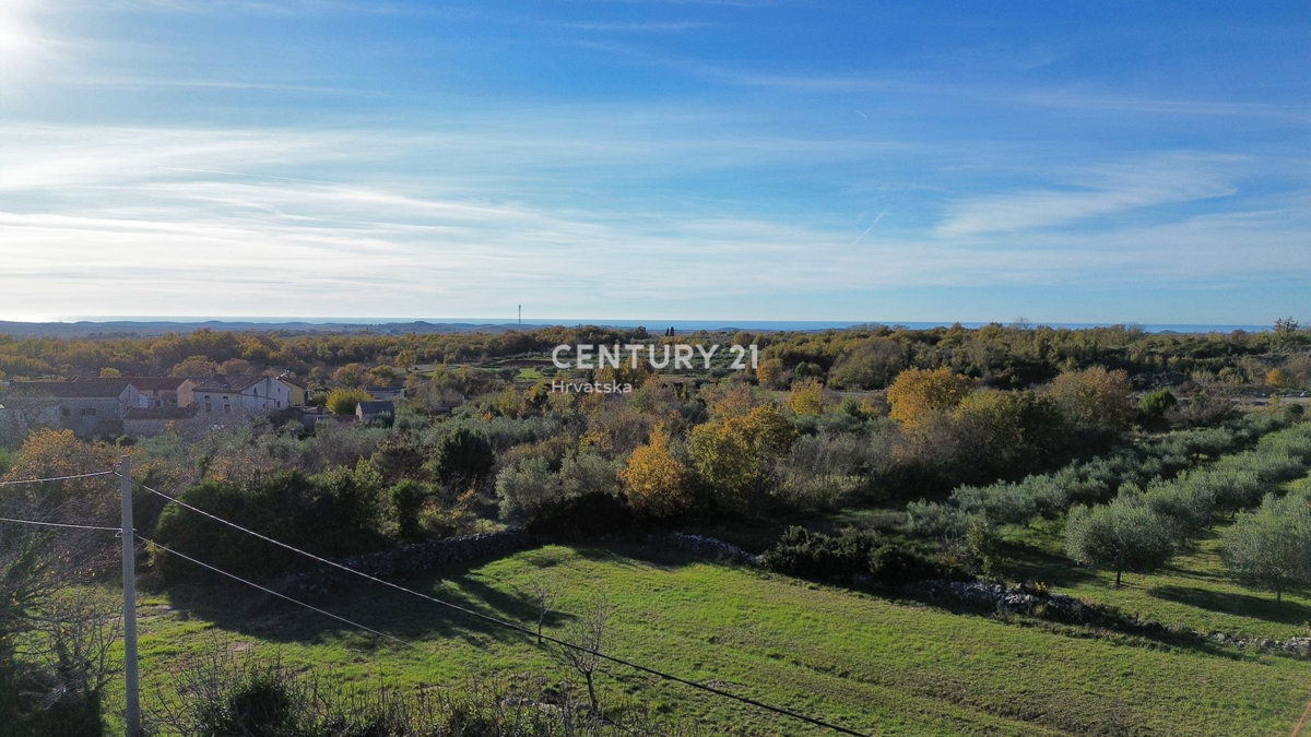 POREČ, SVETI LOVREČ, TERRENO EDIFICABILE CON VISTA MARE
