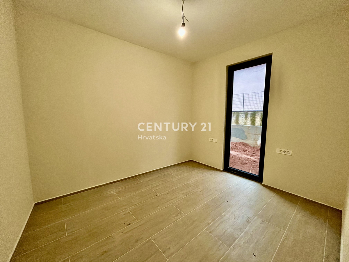 MEDULIN, NUOVO APPARTAMENTO DUE LOCALI AL PIANO TERRA CON GIARDINO