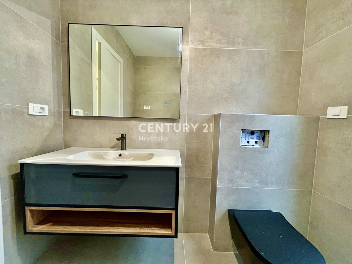 MEDULIN, NUOVO APPARTAMENTO DUE LOCALI AL PIANO TERRA CON GIARDINO