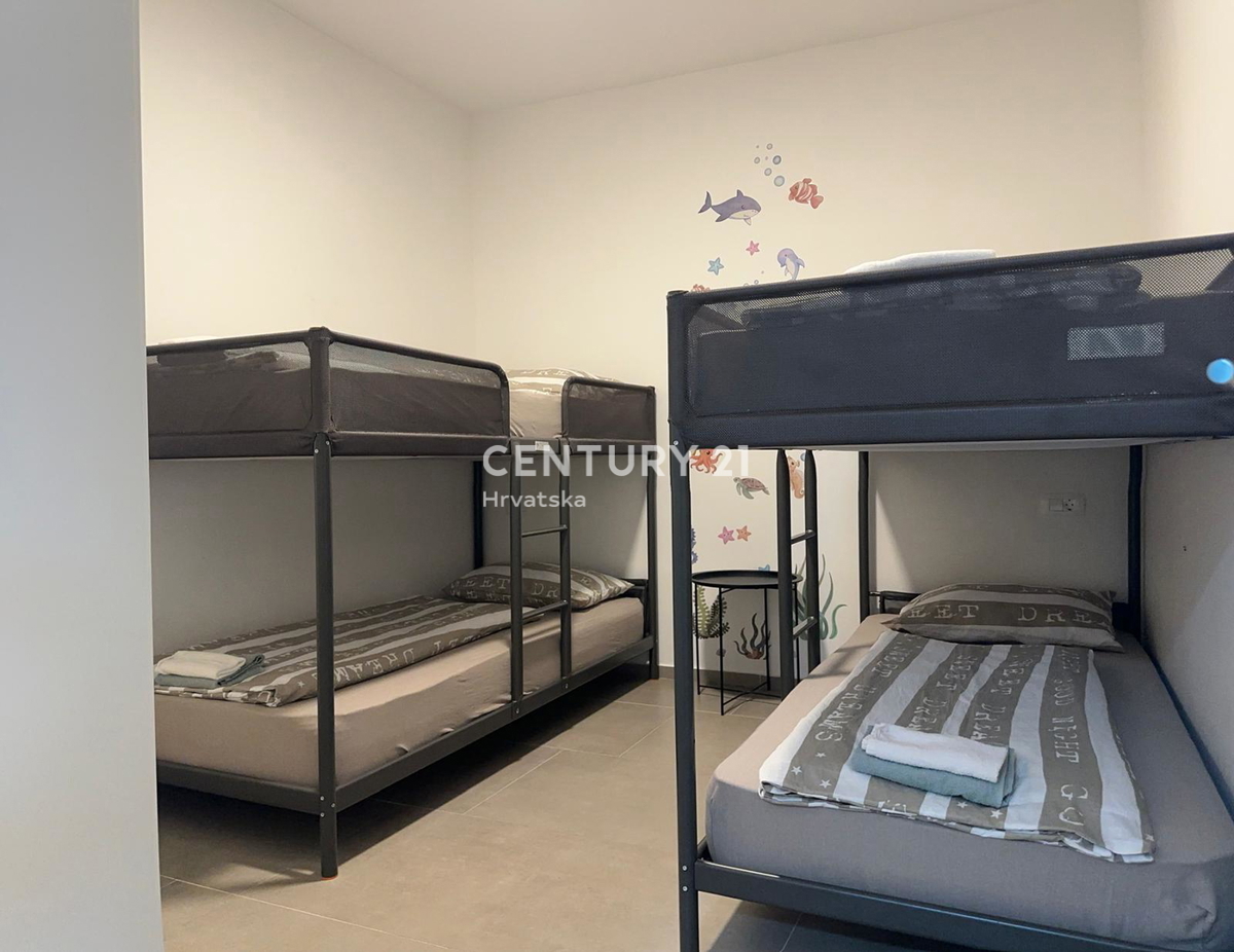 FUNTANA, VENDESI APPARTAMENTO TRILOCALE AL PIANO TERRA CON TERRAZZA DI 50 M2, OTTIMA POSIZIONE