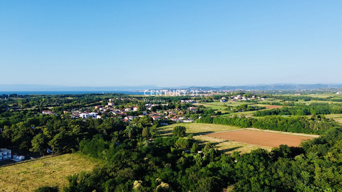 UMAG, BAŠANIJA, TERRENO EDIFICABILE ATTRATTIVO A 300 METRI DAL MARE