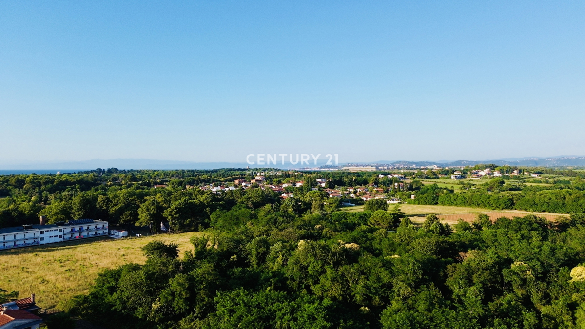 UMAG, BAŠANIJA, TERRENO EDIFICABILE ATTRATTIVO A 300 METRI DAL MARE
