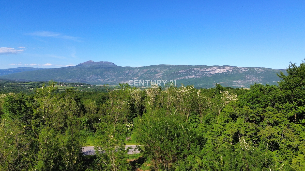 KRŠAN, TERRENO CON PERMESSO DI COSTRUZIONE