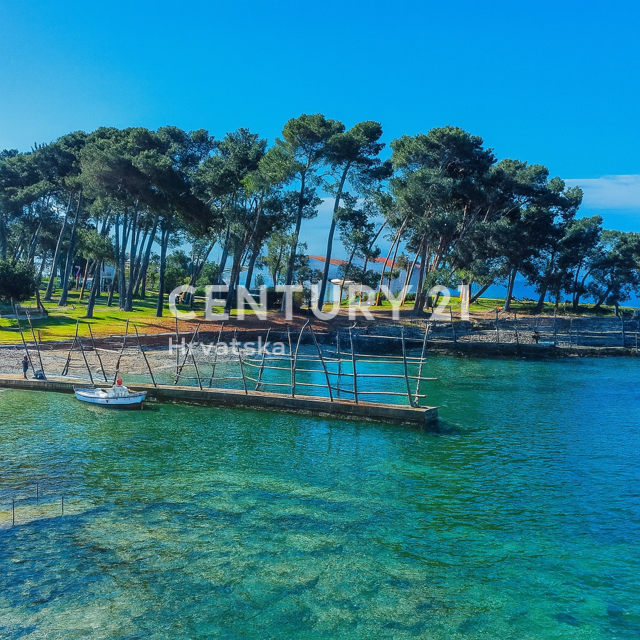 UMAG, TERRENO EDIFICABILE CON VISTA MARE A SOLI 150 METRI DAL MARE E DALLA SPIAGGIA