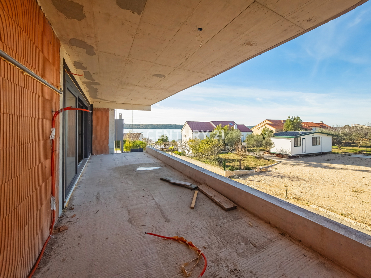 ZADAR, LJUBAČ, LUX. NUOVO. S4= 100,66 m2, 1° piano, 50 M DAL MARE E DALLA SPIAGGIA, VISTA MARE