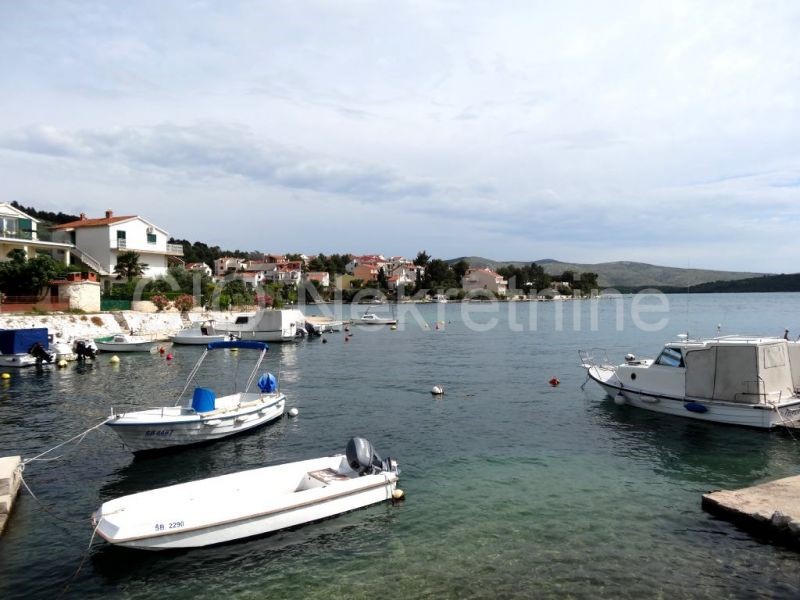 Sibenik, Zaboric, land near the sea with a project for a villa