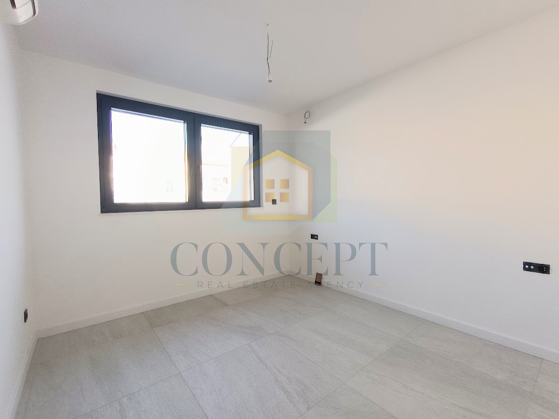 Poreč, centro, Appartamento al 2° piano di un nuovo edificio di lusso con garage, a 200 m dal mare