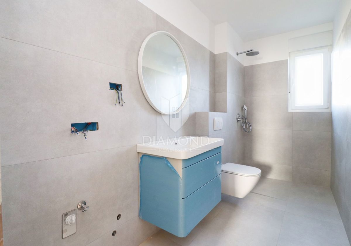 Parenzo, appartamento di nuova costruzione con giardino