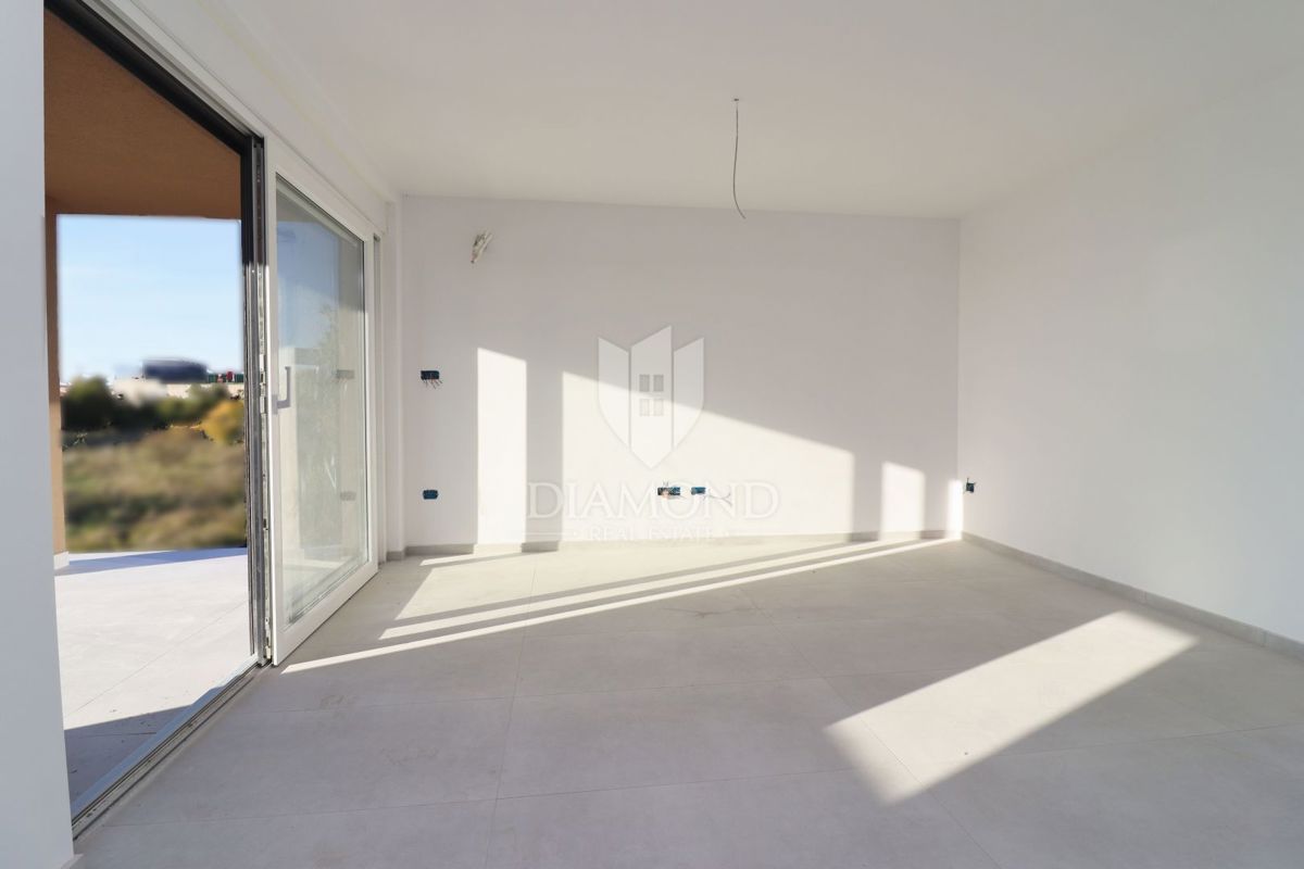 Parenzo, appartamento di nuova costruzione con giardino