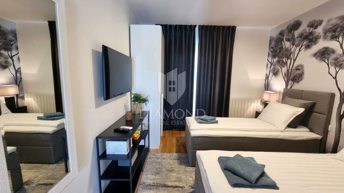 Labin, una bella casa a un piano con piscina