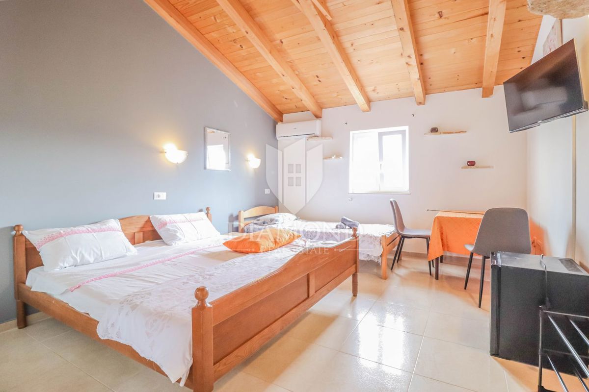 Verteneglio, casa per investimenti con spazio commerciale!