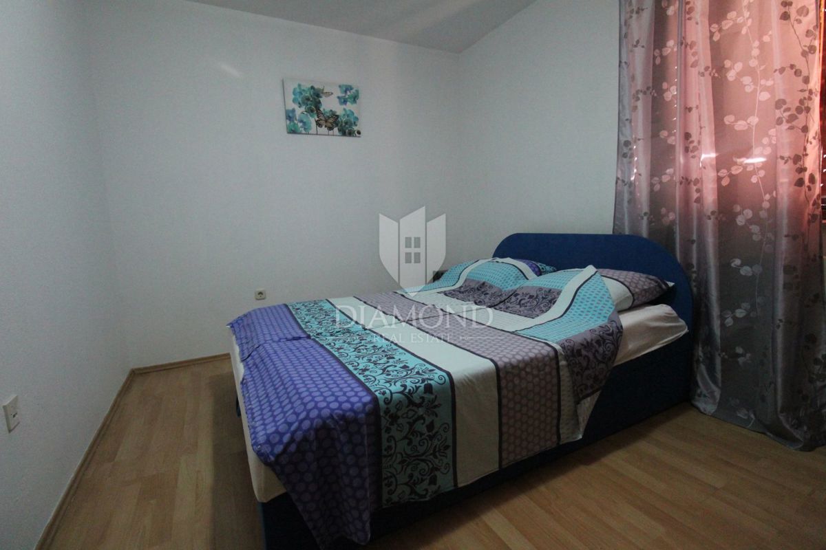 Labin, piano di una casa con 3 appartamenti