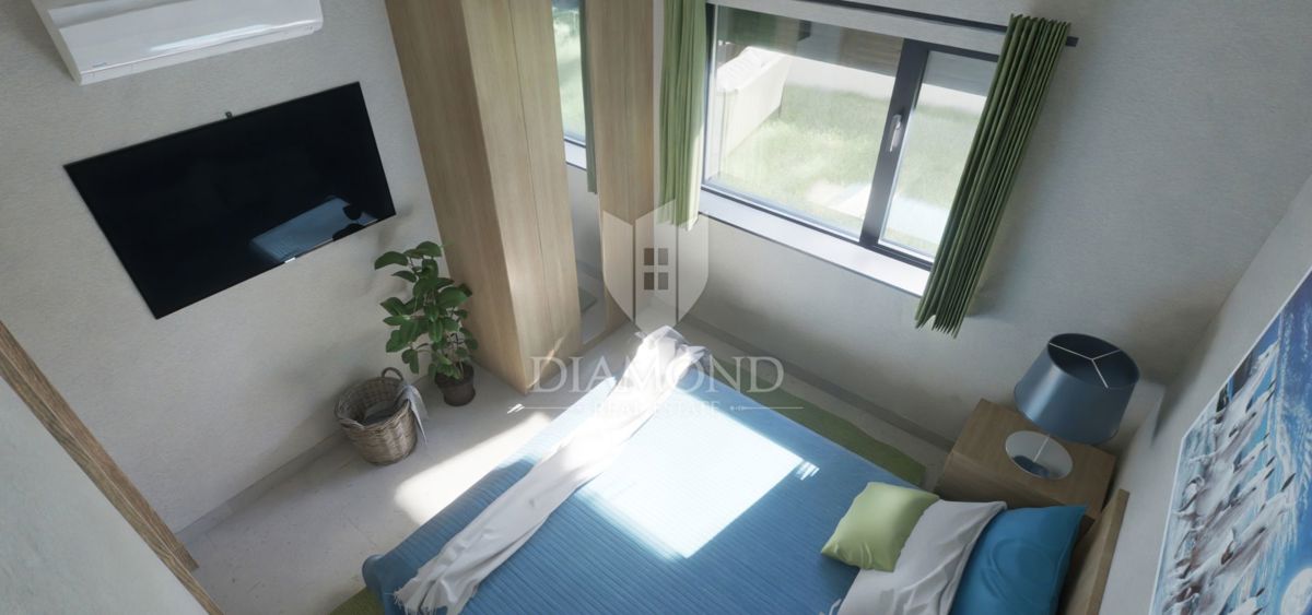 Parenzo, moderno appartamento al piano terra con giardino privato