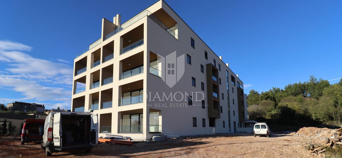 Nuova costruzione nel verde, Appartamento di 55 m² vicino al mare e al centro città