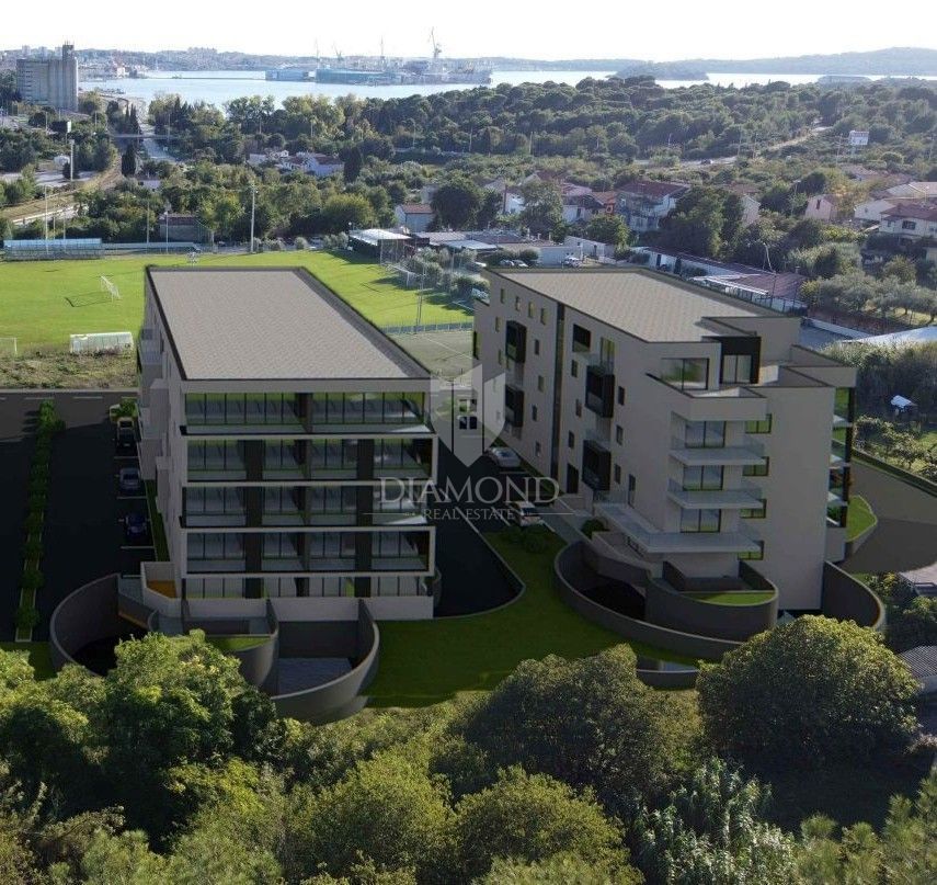 Nuova costruzione nel verde, Appartamento di 55 m² vicino al mare e al centro città