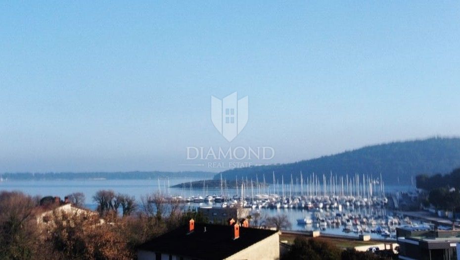 Terreno edificabile attraente a Pomer - possibilità di costruire più appartamenti