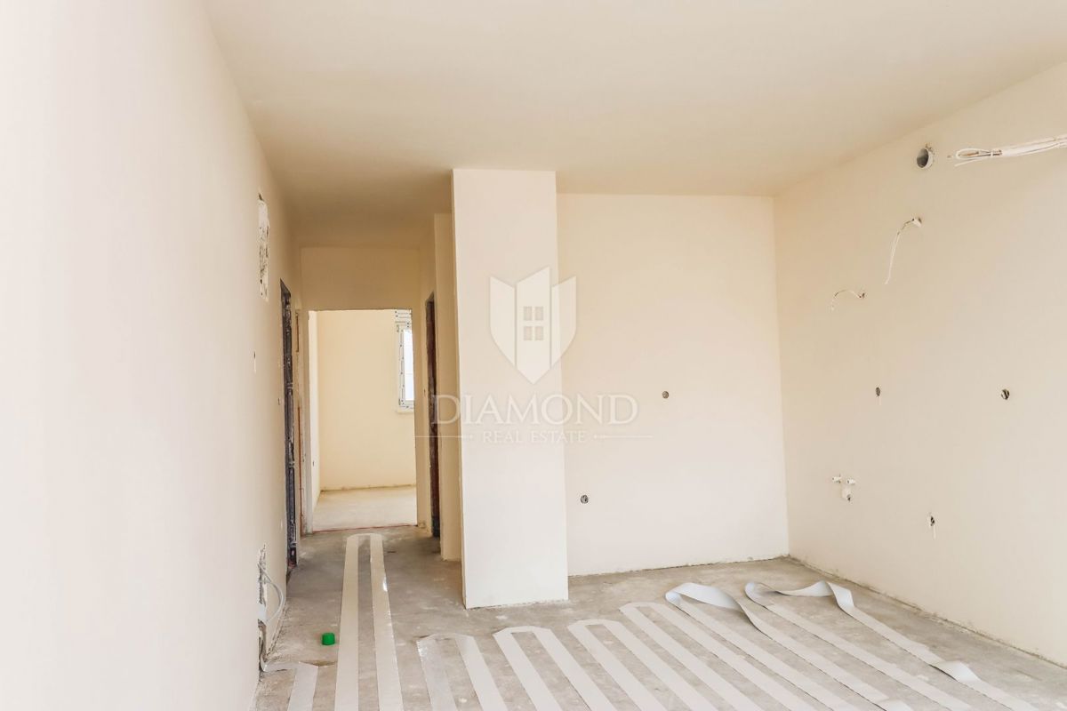 Pola: confortevole appartamento con 2 camere da letto e 2 posti auto.