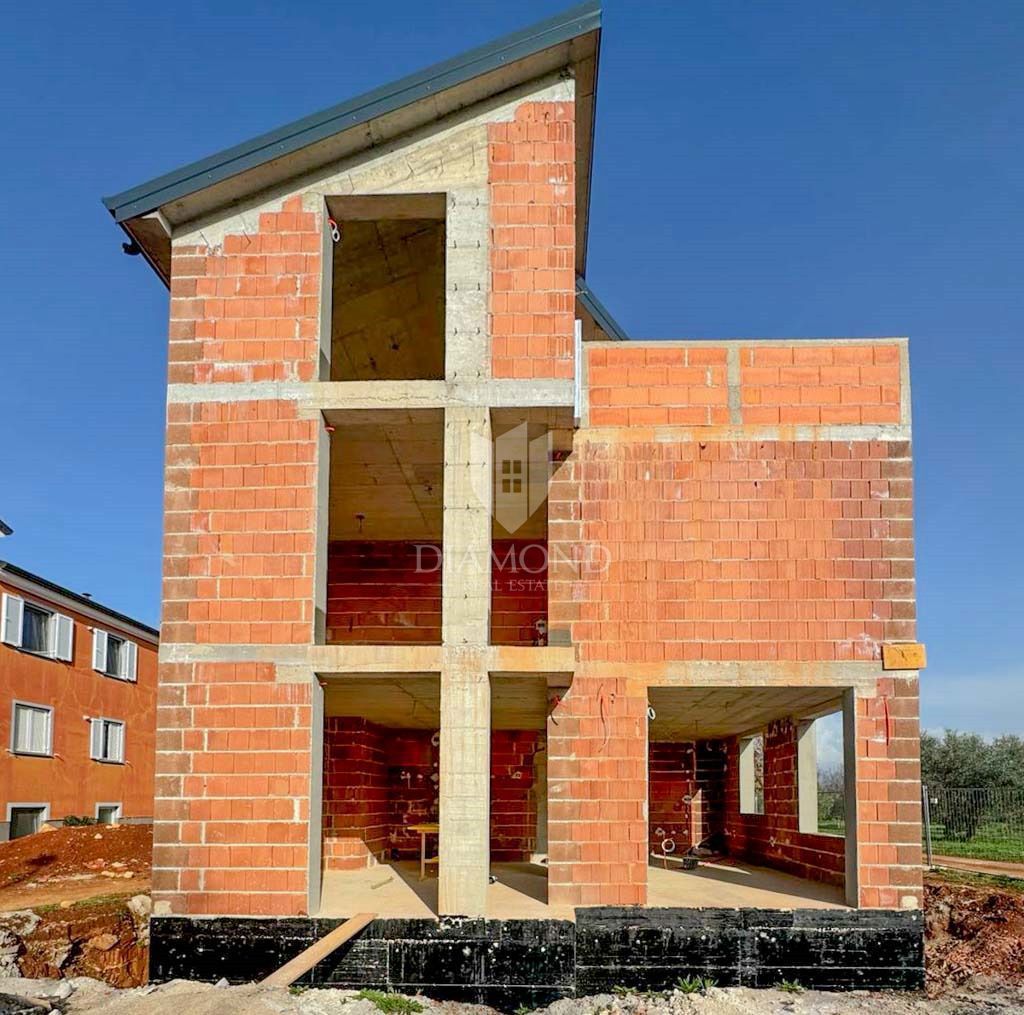 Umago nuova costruzione, appartamento su due piani con vista mare