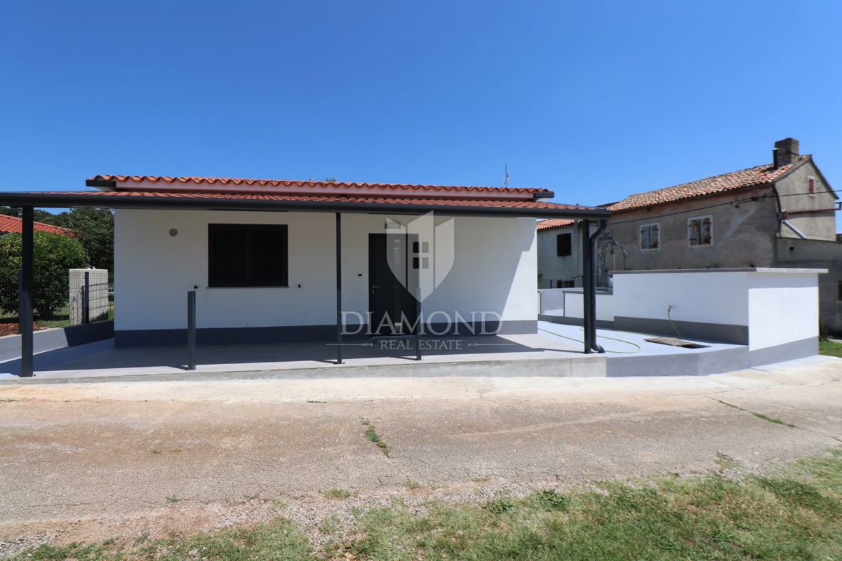 Labin, casa a un piano con ampio giardino