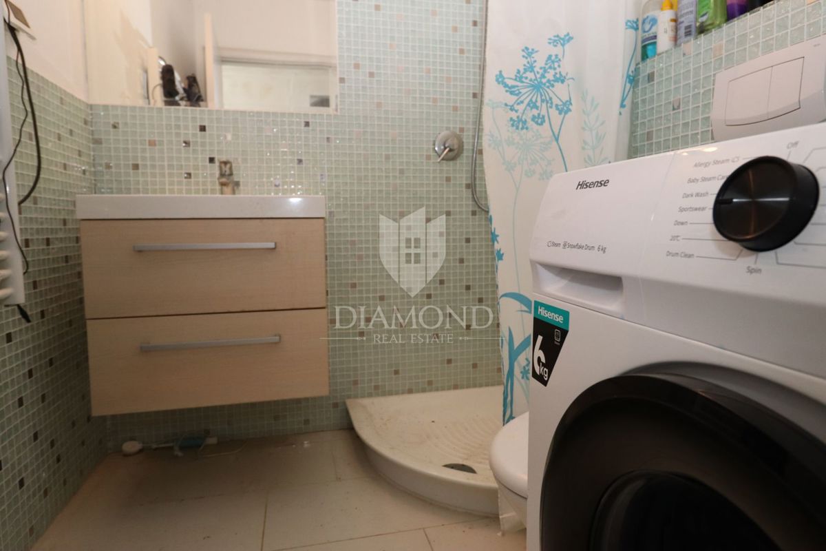 Volme, casa su tre piani con giardino e vista mare