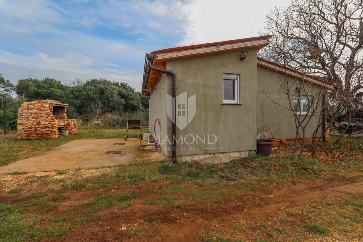 Nuova casetta vacanze 42 m², giardino 360 m² – quiete, natura e mare a portata di mano