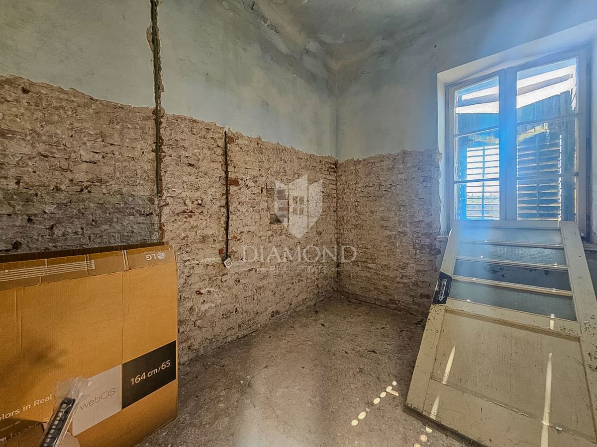 Buje, casa in pietra con 4 appartamenti, ideale come investimento!