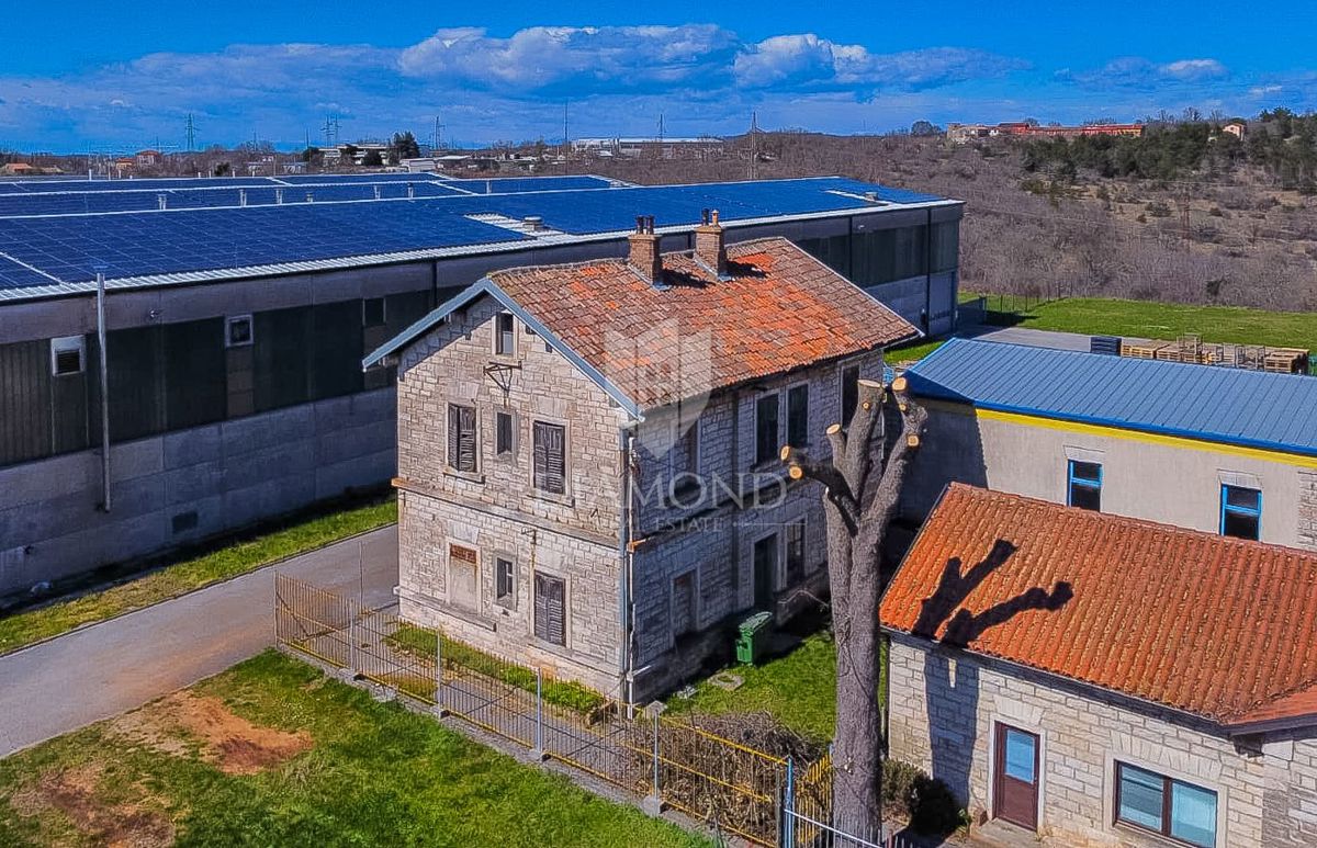 Buje, casa in pietra con 4 appartamenti, ideale come investimento!