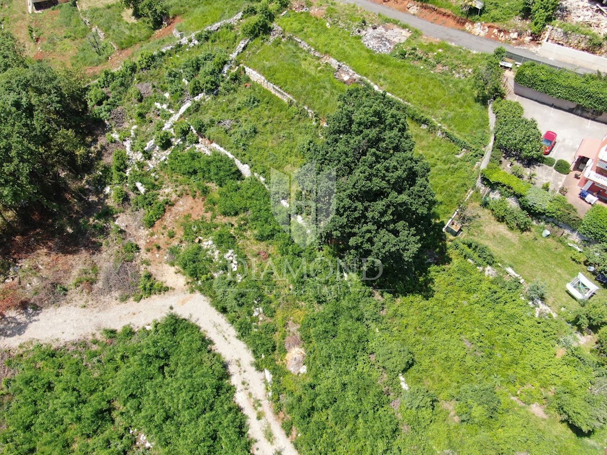 Opatija, dintorni, terreno edificabile con una bellissima vista sul mare